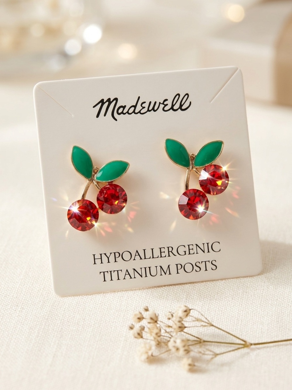 Madewell cherry drop earrings.
